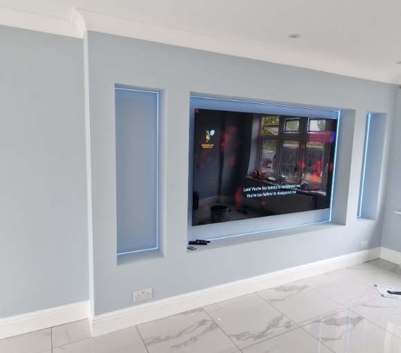 Recessed media wall and joinery by AG Signature Renovation